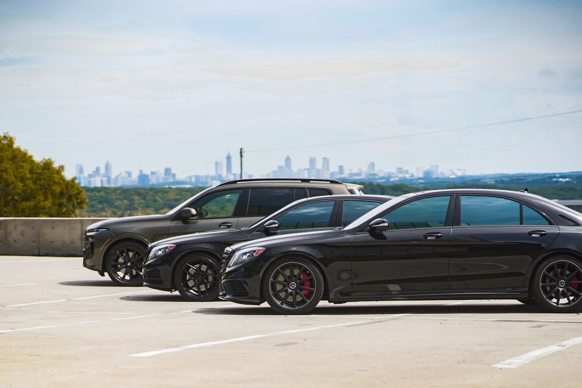 Atlanta Car Rentals fleet parked with the Atlanta skyline behind